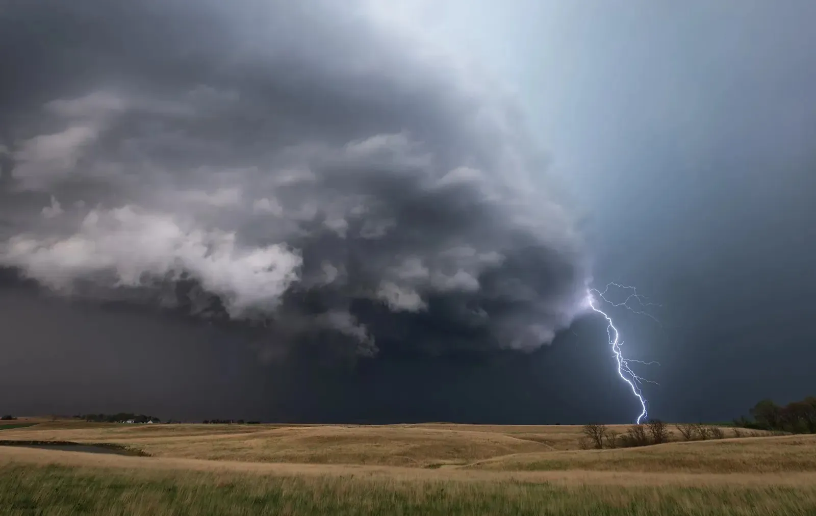 Lightning striking the earth during a thunderstorm'
