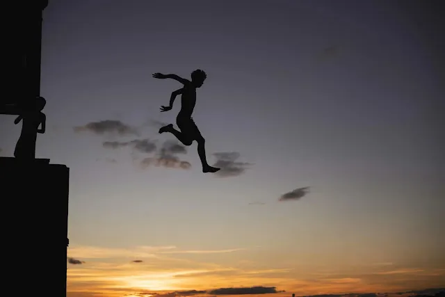 a person jumps and gets captured in an image.