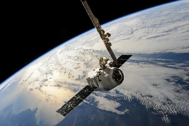 Satellite in the orbit around earth.
